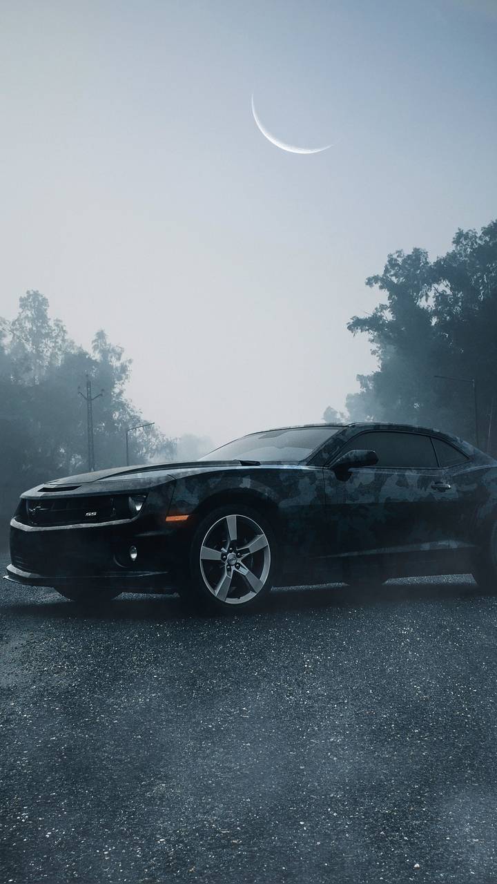 Download Caption: Powerful Chevrolet Camaro SS - A Perfect Companion for  Your iPhone Wallpaper | Wallpapers.com