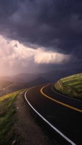 Cloudy Sky and Road iPhone Wallpaper