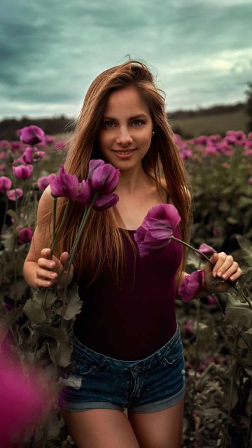 long hair women outdoor in flower field iPhone Wallpaper