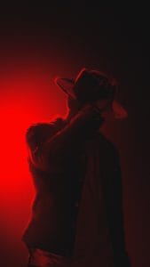 Guy with Hat iPhone Wallpaper HD