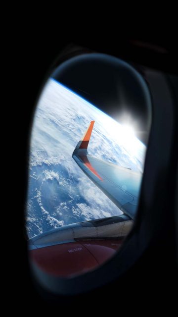Plane Window View iPhone Wallpaper HD