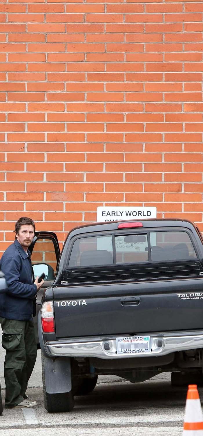 Christian Bale with his Toyota iPhone Wallpaper