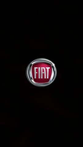 Circular red Fiat badge with silver lettering and a polished chrome rim centered on a black screen.