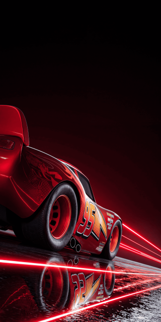 Disney Pixar's Lightning McQueen race car reflected on a sleek wet surface with bright red light trails streaming past.