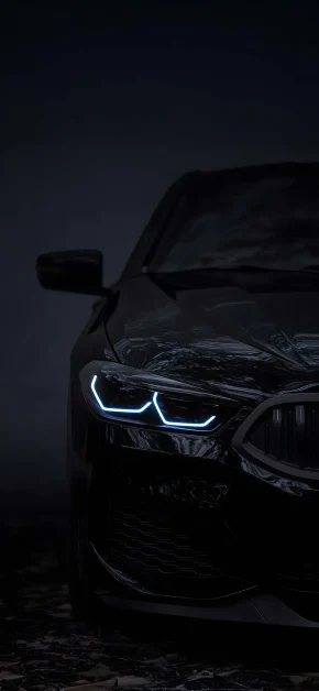 30 Best HD BMW iPhone Wallpapers (4K M Series & Classic) 3 bmw-8-series-blue-headlight-dark-iphone-wallpaper
