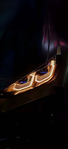 30 Best HD BMW iPhone Wallpapers (4K M Series & Classic) 5 bmw-headlight-closeup-amber-glow-iphone-wallpaper