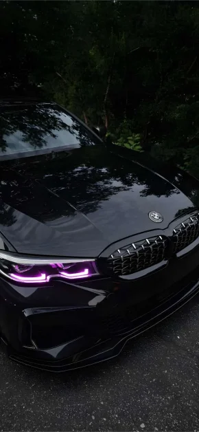 30 Best HD BMW iPhone Wallpapers (4K M Series & Classic) 23 bmw-purple-headlights-night-iphone-wallpaper