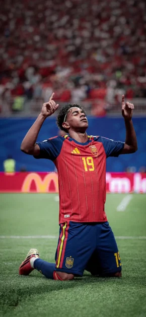 Lamine Yamal Football Wallpapers for iPhone (4K/HD) 11 lamine-yamal-emotional-knee-slide-celebration-wallpaper