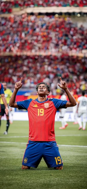 Lamine Yamal Football Wallpapers for iPhone (4K/HD) 13 lamine-yamal-pointing-to-sky-spain-iphone-wallpaper