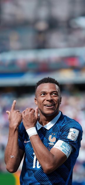Kylian Mbappé Wallpapers: Best 4K & OLED iPhone Backgrounds 6 mbappe-france-fff-smiling-finger-gun-pose-wallpaper-iphone