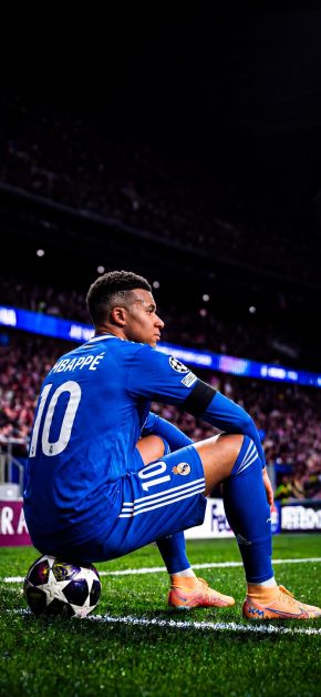 Kylian Mbappé Wallpapers: Best 4K & OLED iPhone Backgrounds 12 mbappe-real-madrid-blue-away-kit-sitting-champions-league-wallpaper-iphone