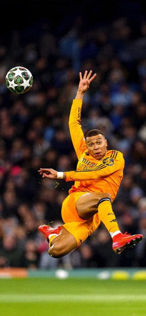 Kylian Mbappé Wallpapers: Best 4K & OLED iPhone Backgrounds 13 mbappe-real-madrid-orange-away-kit-overhead-kick-champions-league-wallpaper-iphone
