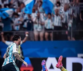 Lionel Messi FIFA iPhone Wallpapers | HD & 4K Backgrounds 6 messi-argentina-dribbling-goalkeeper-down-world-cup-2026-blue-fans-wallpaper